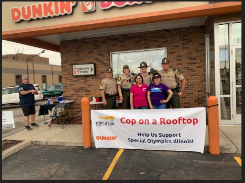 Dunkin' Cop on a Rooftop